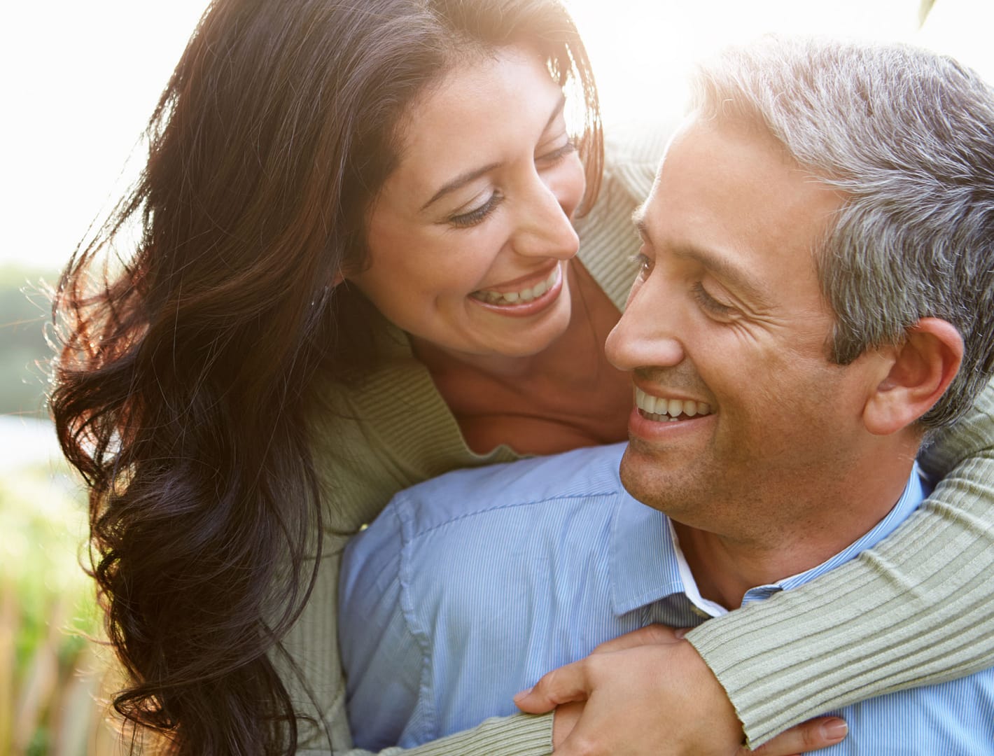 latino couple hugging
