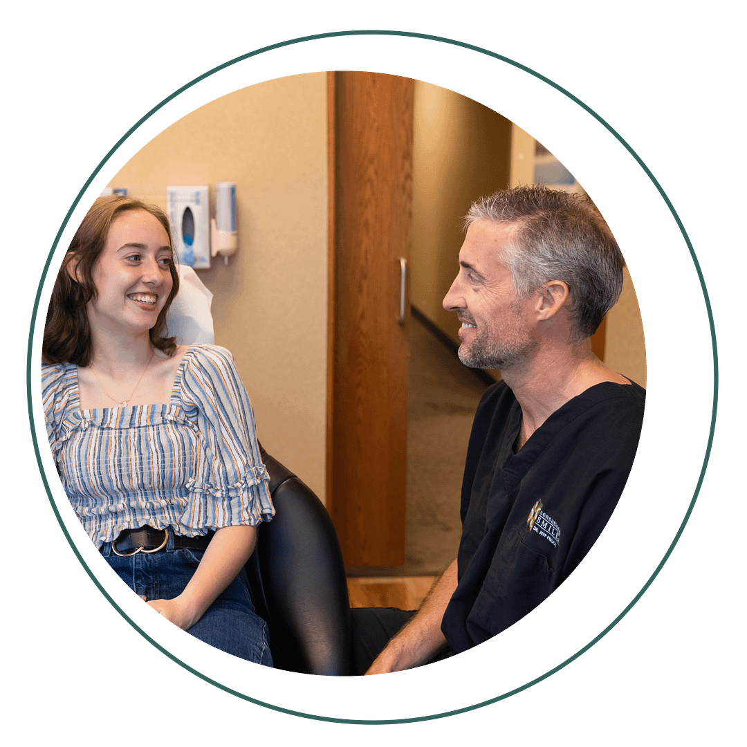 Dr. Feiock with patient in exam room