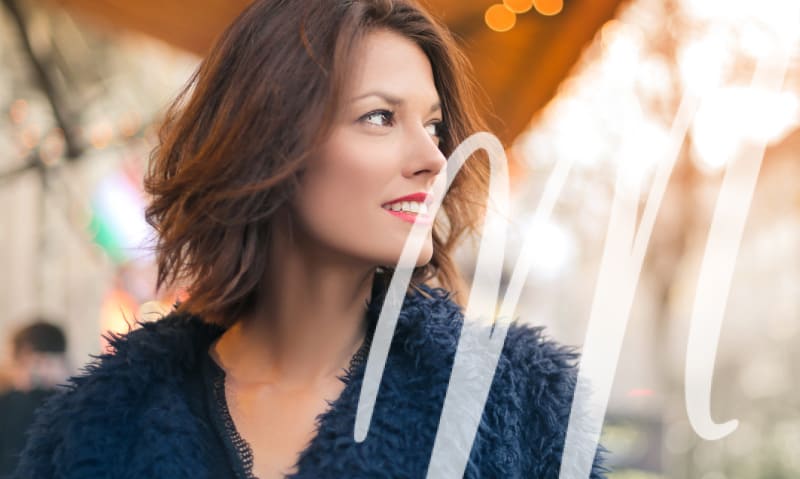 woman in dark blue furry top and red lipstick