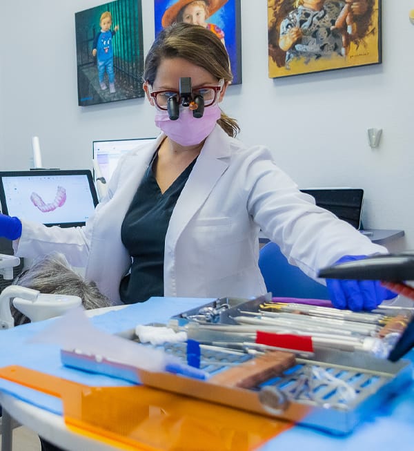doctor with patient in chair