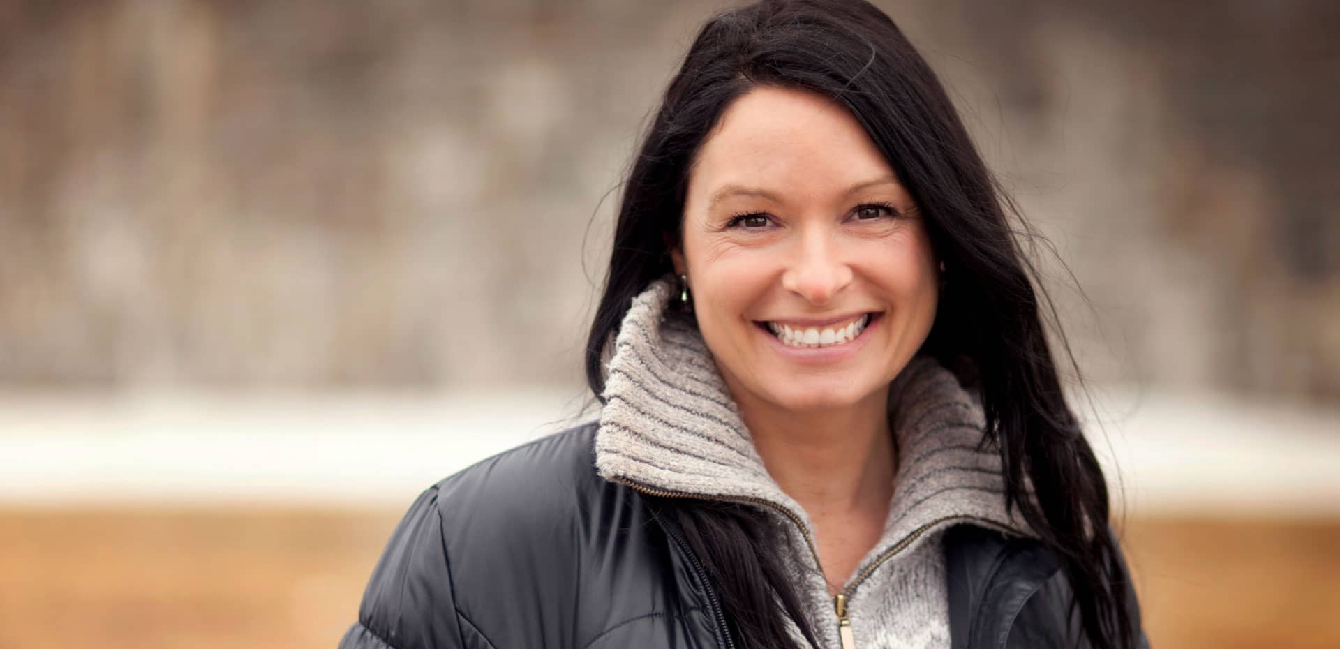 cosmetic-hero smiling ethnic woman outside