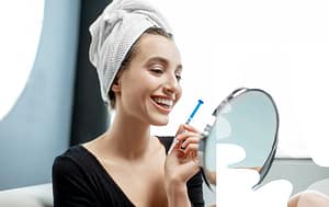 Brighten your smile with take-home whitening trays.