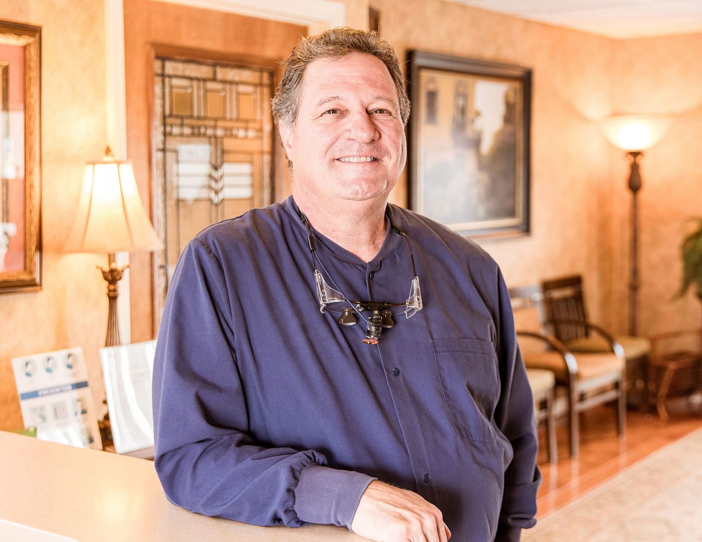 Dr. Sexton standing in office lobby