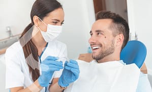 Choosing between Invisalign and veneers.