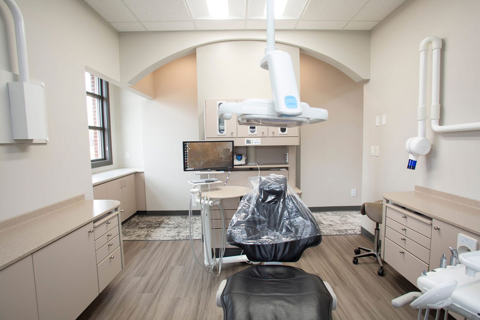 exam room with dental chair and equipment