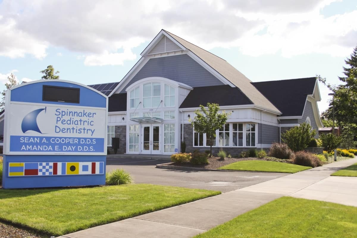 spinnaker office building with sign out front