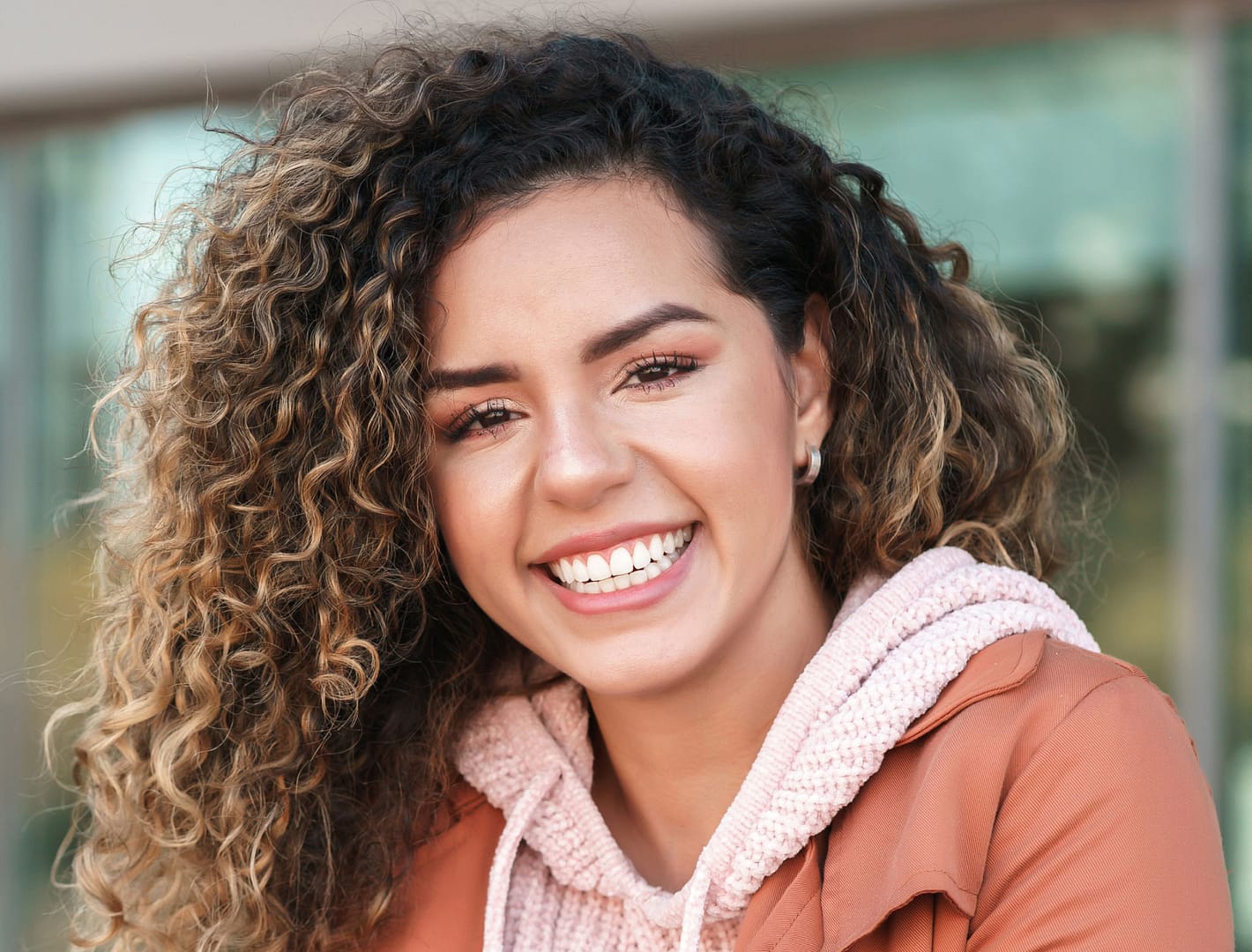 Downloaded Save to Library Preview Crop Find Similar File #: 447730359 Latino woman smiling while standing outdoors on the street