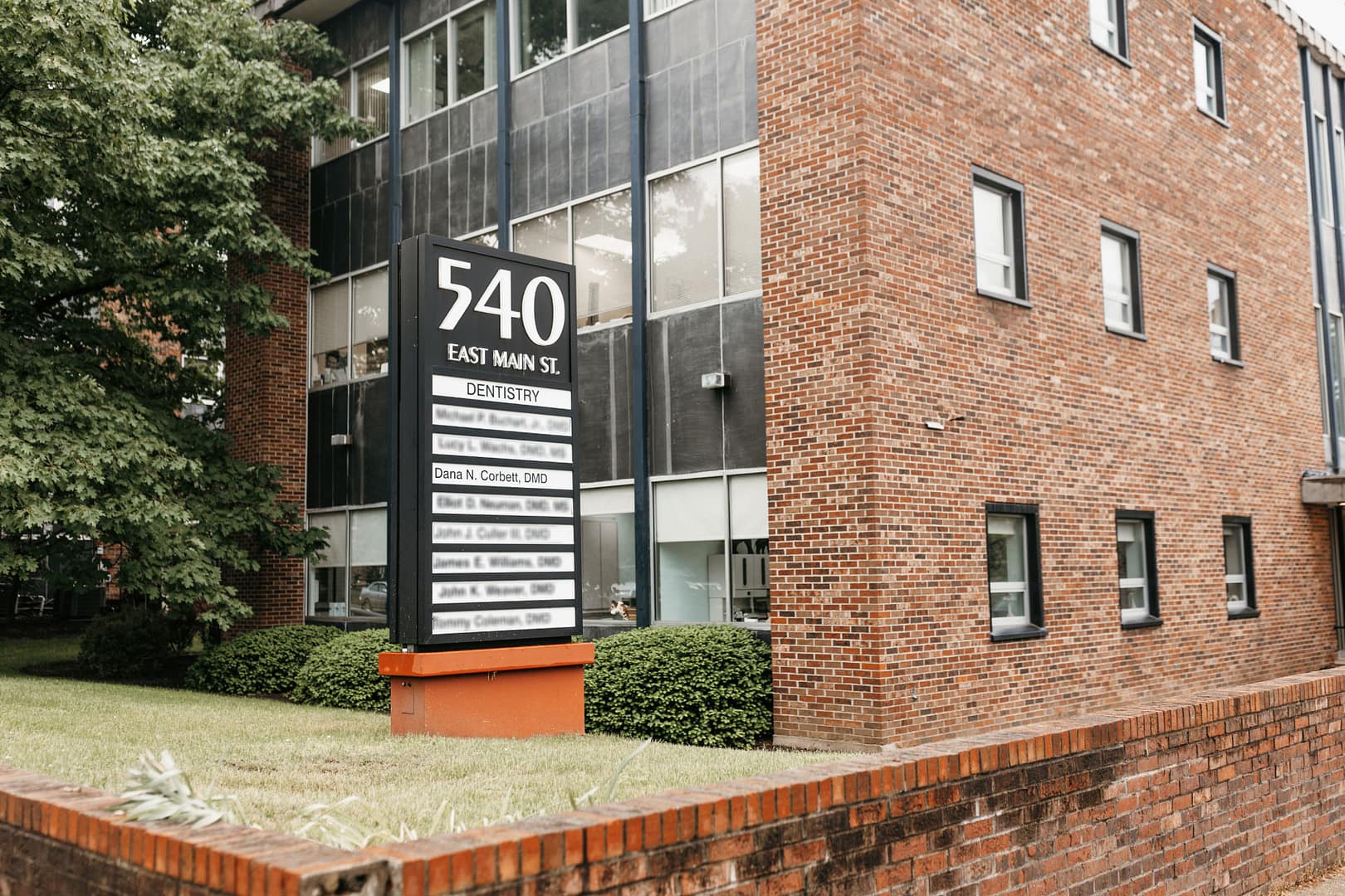 office building exterior with sign