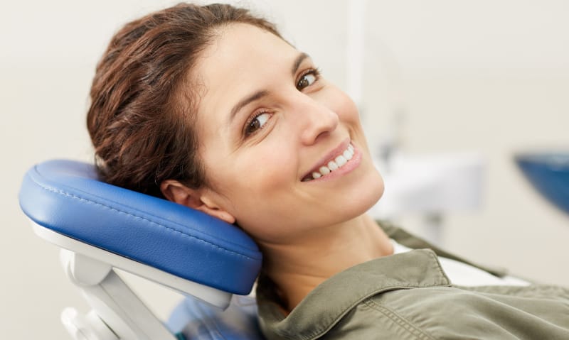 cleaning patient smiling