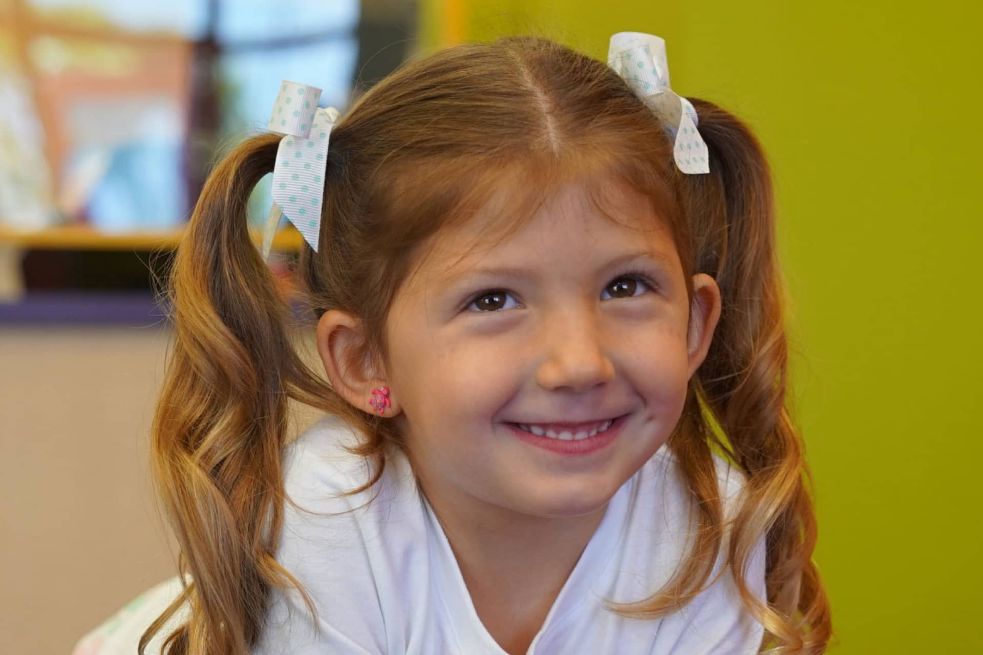 little girl with pigtails