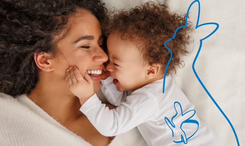 Mom and baby smiling