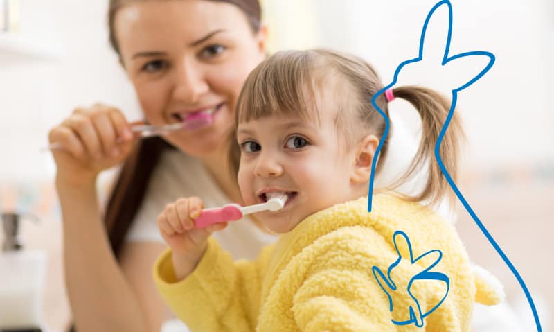 pediatric patient brushing her teeth