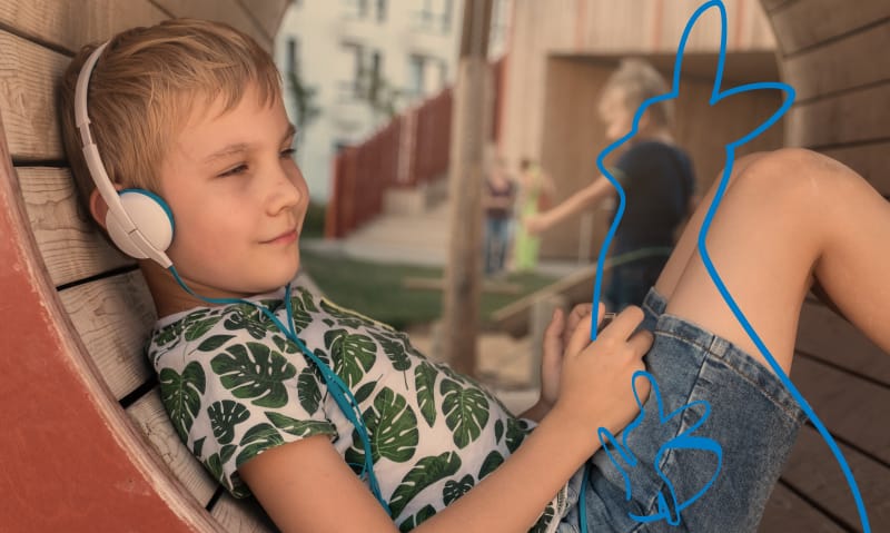 Pediatric patient listening to headphones