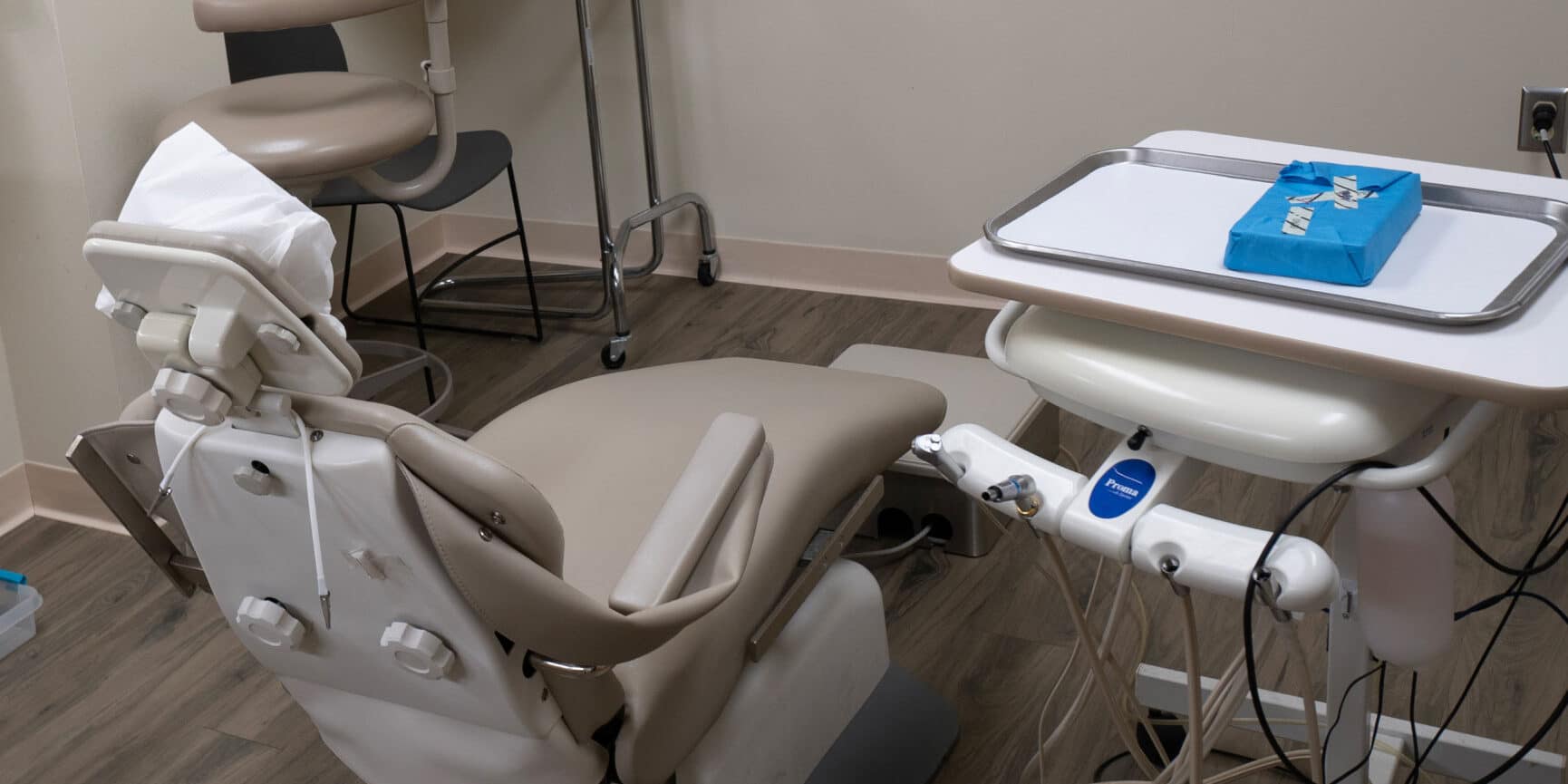 exam room with dental chair and equipment