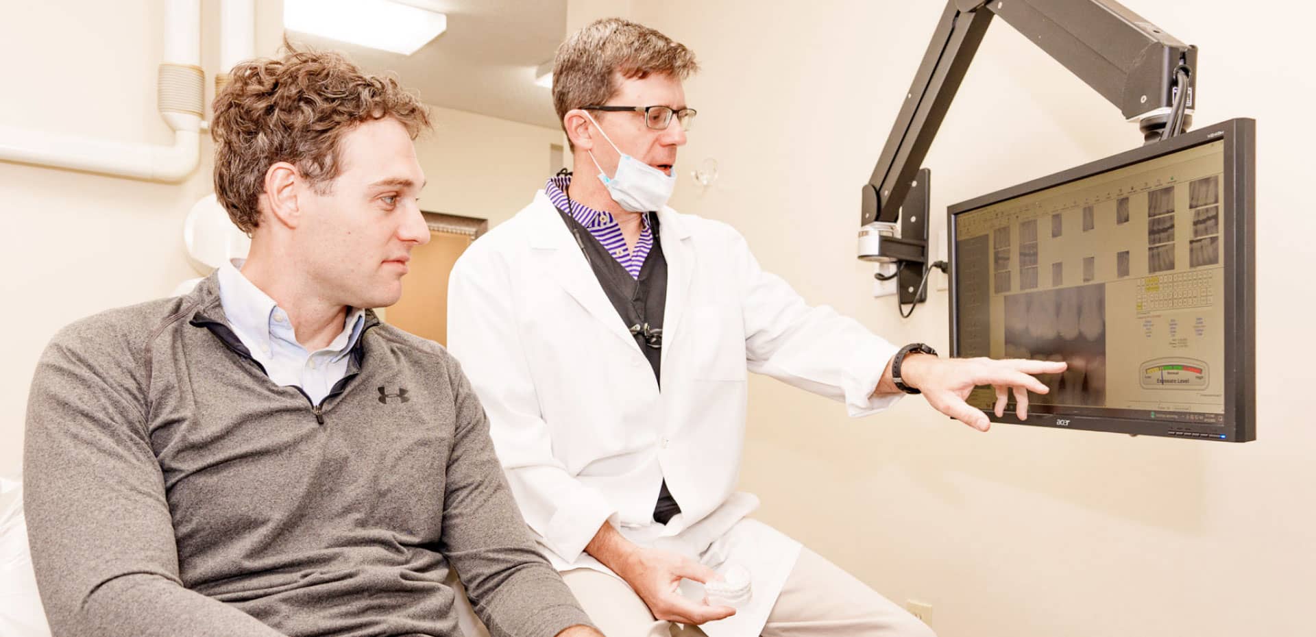 cosmetic-hero dr. monroe with patient